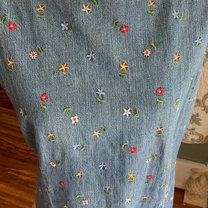 Denim dress with floral stitching design